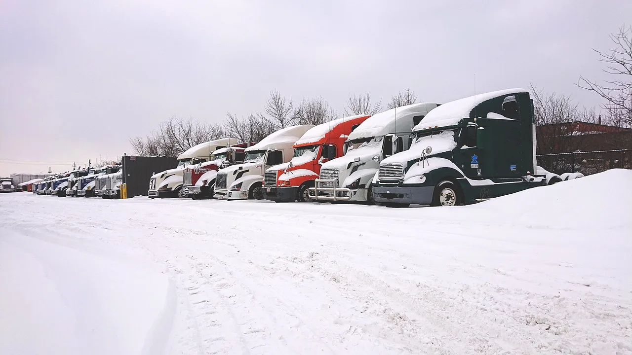 trucks in snow, snow truck, truck yard, winter, trucks, snow truck, snow truck, snow truck, snow truck, snow truck, truck yard, truck yard, truck yard, truck yard, truck yard. Ohio dumpster rental business operations in winter