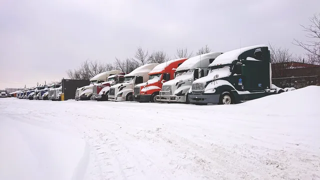 trucks in snow, snow truck, truck yard, winter, trucks, snow truck, snow truck, snow truck, snow truck, snow truck, truck yard, truck yard, truck yard, truck yard, truck yard. Ohio dumpster rental business operations in winter